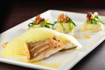 Tasty healthy fish fillet with potato and vegetables