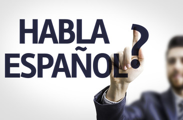 Business man pointing: Do You Speak Spanish? (In Spanish)