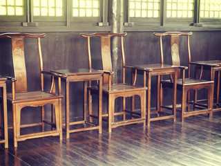 old chair in room with retro filter effect