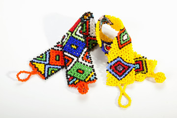 Brightly Colored Zulu Beaded Wristbands in Shape of Aids Ribbons
