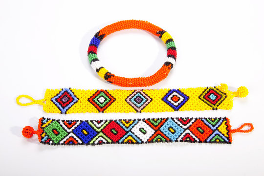Two Brightly Colored Zulu Wristbands with Beaded Armband