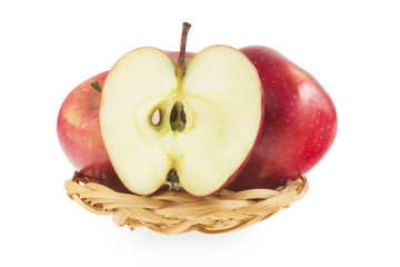 Red apples in a basket on a white background