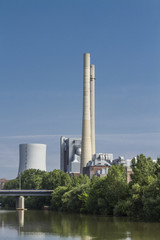 Fototapeta na wymiar power plant at german river with blue sky