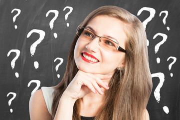 Woman and question marks arround her
