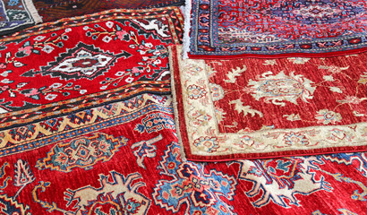 Asian rugs for sale in the shop of fabrics and textiles