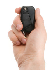 Hand holding car keys isolated on white background - 75755247