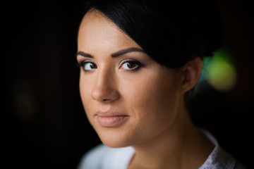Fototapeta premium Bride makes wedding makeup