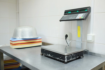 closeup industrial scales in the culinary workshop