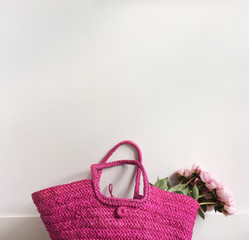 Bouquet of peonies in a bag