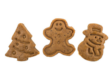 Gingerbread dough for Christmas cookies and cookie cutters.