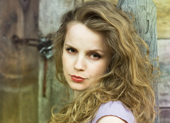 beautiful curly blonde with red lips.