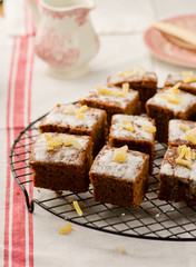 slices of a ginger parkin on a lattice for cooling.