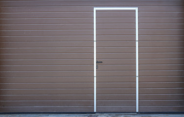 metal gate of garage with door