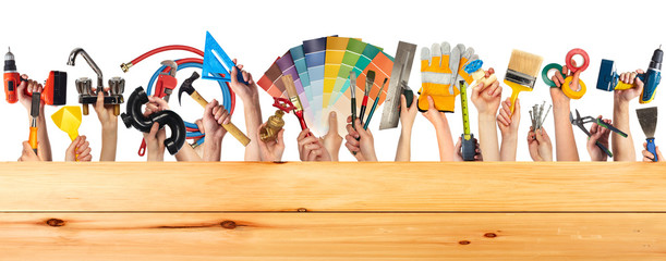 Hands with DIY tools.