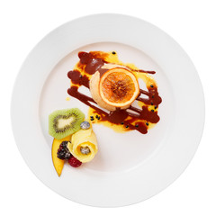 Ice-cream dessert with fruits in plate, isolated