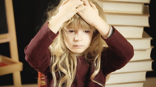 Little girl school face worried