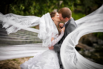 Bride and groom in the park
