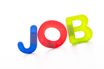 Plastic letters isolated on white background.