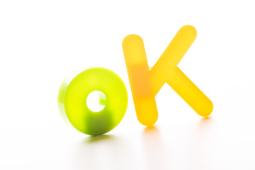 Plastic letters isolated on white background.