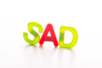 Plastic letters isolated on white background.