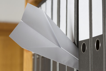 Paper Plane stuck between folders