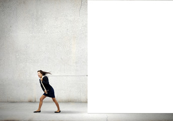 Woman pulling banner