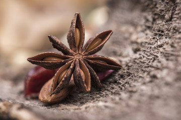 Star anise over a wooden surface