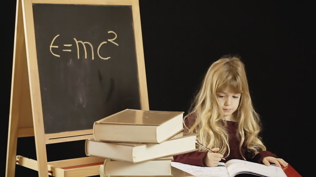 Little girl school study science blackboard
