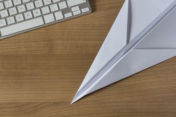 Paper Plane on an office desk