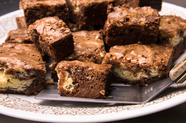 Cream cheese brownies on a plate