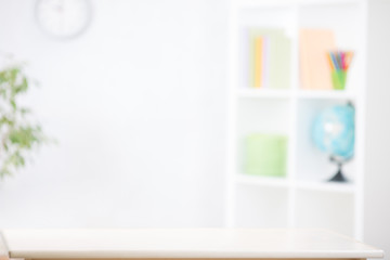 nursery room blurred background with writting desk