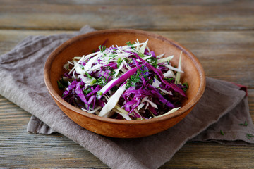 Obraz na płótnie Canvas Fresh salad with chopped cabbages
