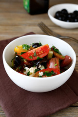 Salad with tomatoes, olives and cheese