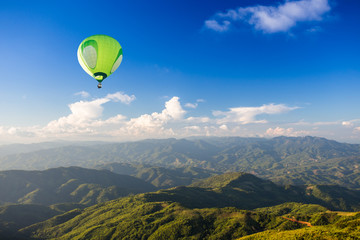 Hot air balloon over mountain