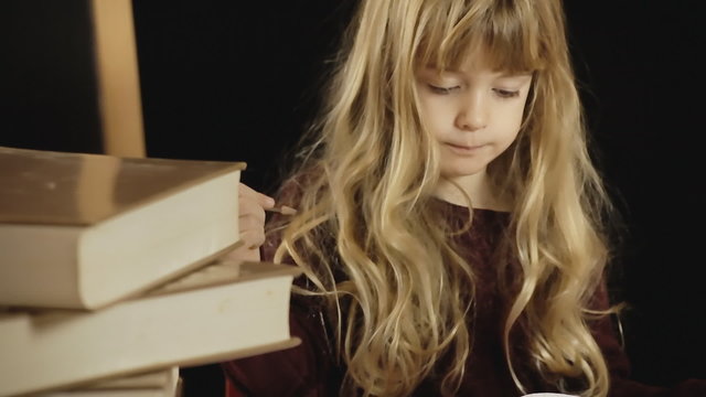 Little girl school write spell close-up