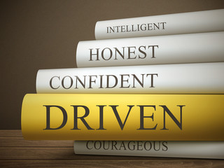 book title of driven isolated on a wooden table