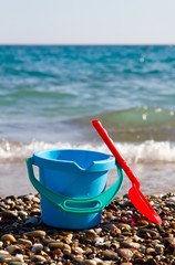 Fototapeta na wymiar Bucket and spade at the beach