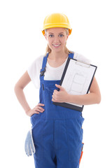woman in blue builder uniform holding clipboard with building sc