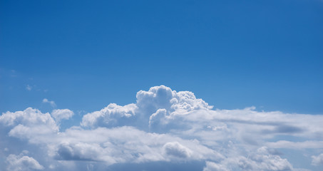 Blue sky with white clouds.