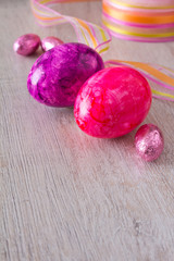 Easter eggs purple copy space