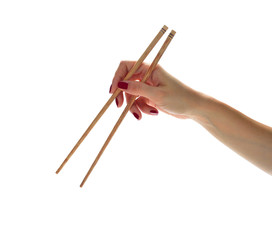 Woman hands holding chopsticks isolated on white