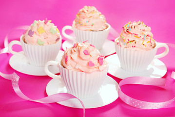 cupcakes in tea cup shape molds for birthday party