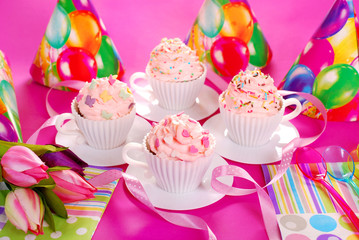 cupcakes in tea cup shape molds for birthday party