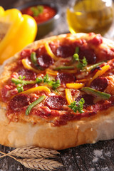 pizza with paprika and pepperoni