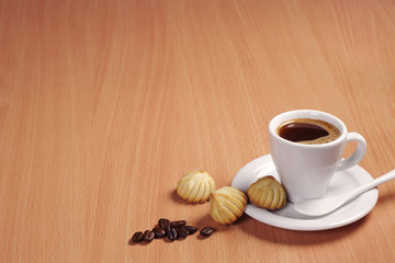 Coffee cup and cookies