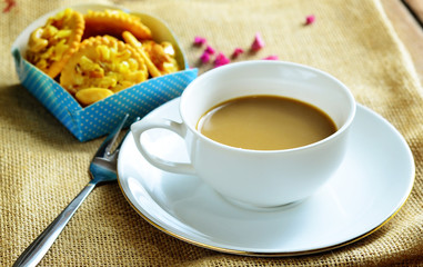Coffee cup and beans