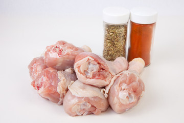 Raw chicken legs with spices