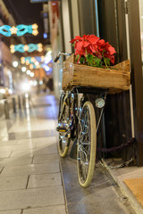 Fototapeta na wymiar Retro bike on Christmas in the city