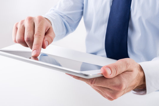 Businessman using a digital tablet.