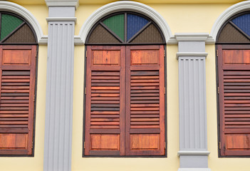 wood window decorated with color glasses